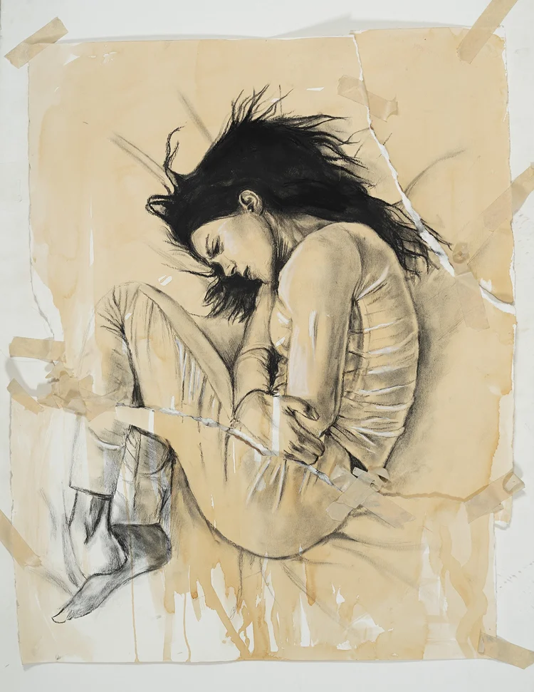 Charcoal and tea-stained drawing of a person curled up, hair covering their face.