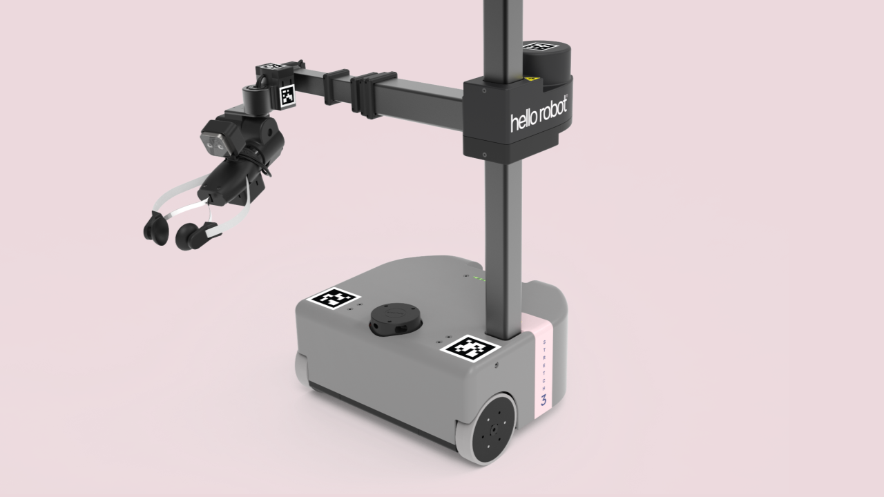 A Hello Robot Stretch 3 mobile manipulator on a pale pink background.